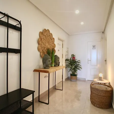 Апартаменты Palmeras Puerto Торевьиа